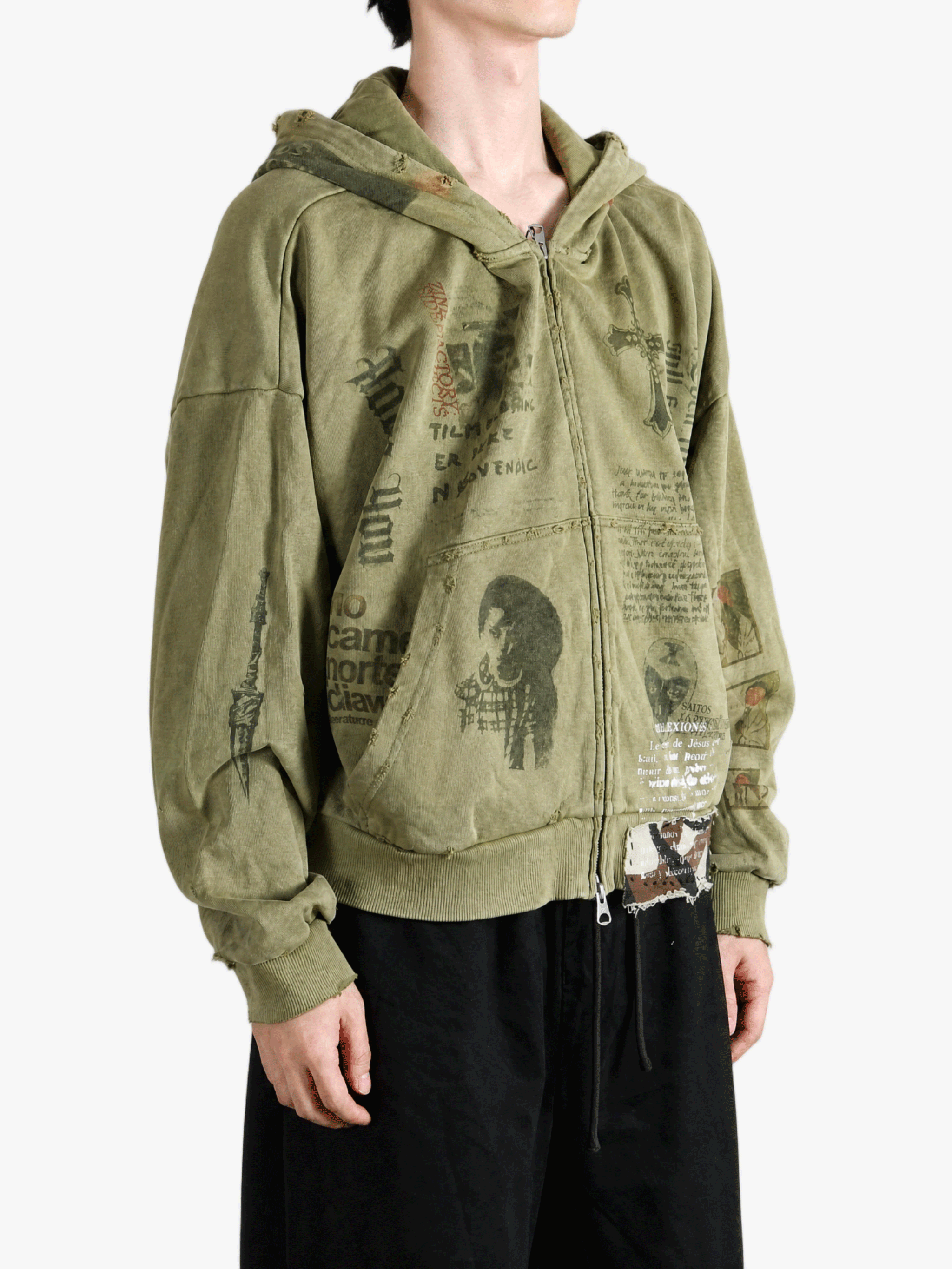 Green hoodie worn by a person, showing the hoodie fit