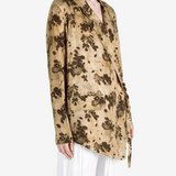 Tan jacket worn by a person, showing the jacket fit
