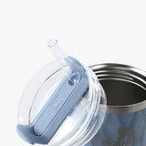 Close up of blue tumbler, showing texture of the stainless steel fabric