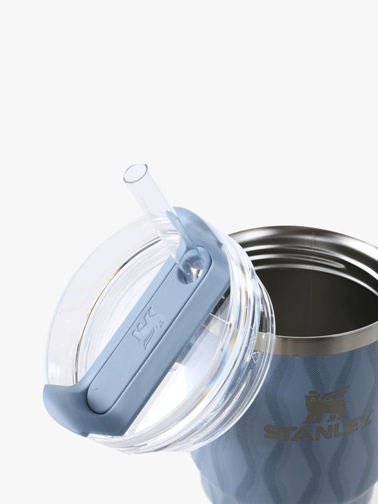 Close up of blue tumbler, showing texture of the stainless steel fabric
