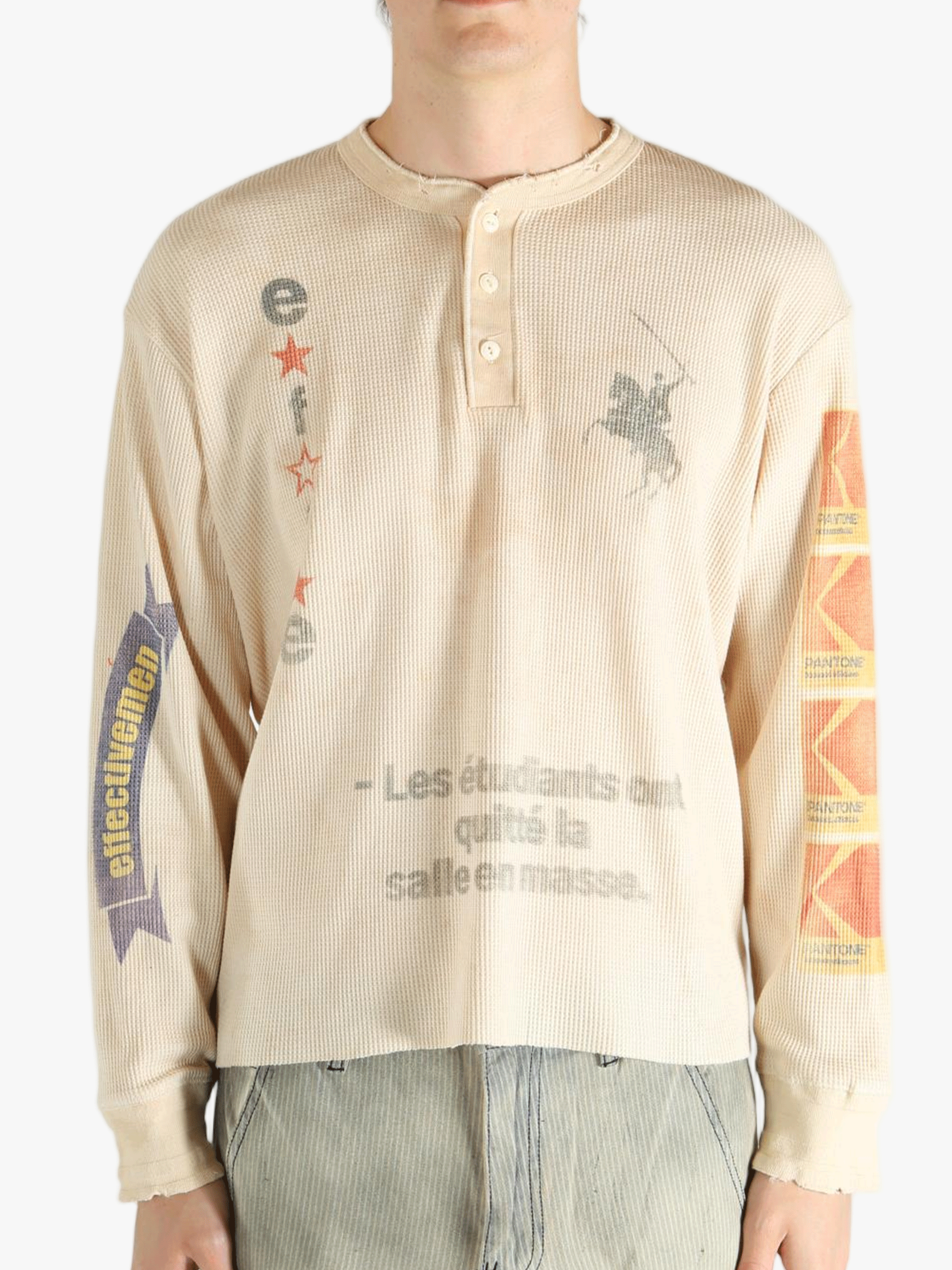 Tan shirts worn by a person, showing the shirts fit