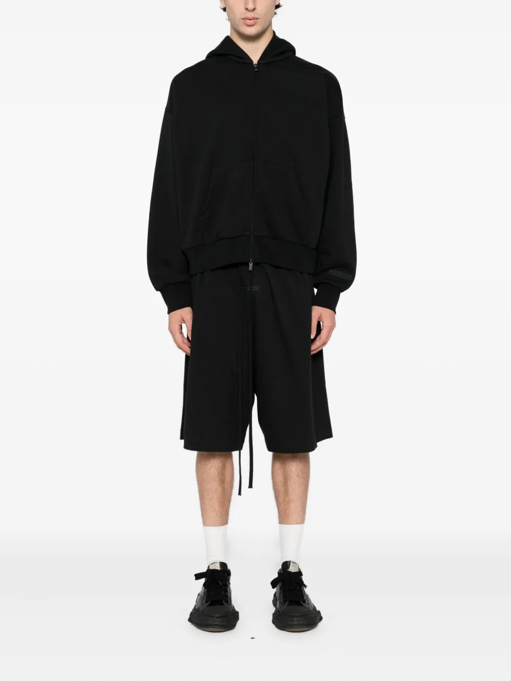 Black shorts,full body view