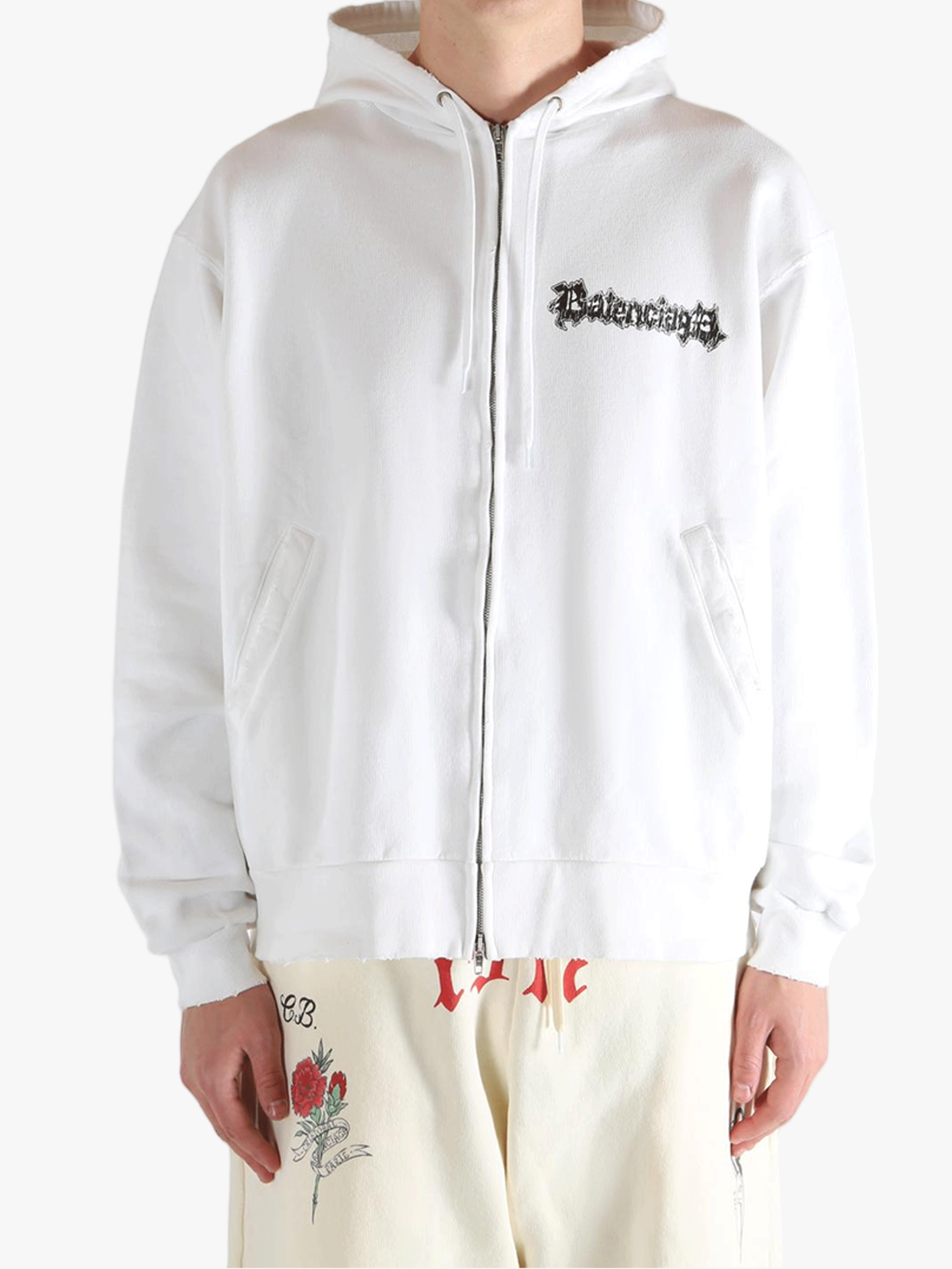 White hoodies worn by a person, showing the hoodies fit