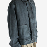 Blue jacket worn by a person, showing the jacket's fit