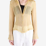 Tan shirt worn by a person, showing the shirt fit