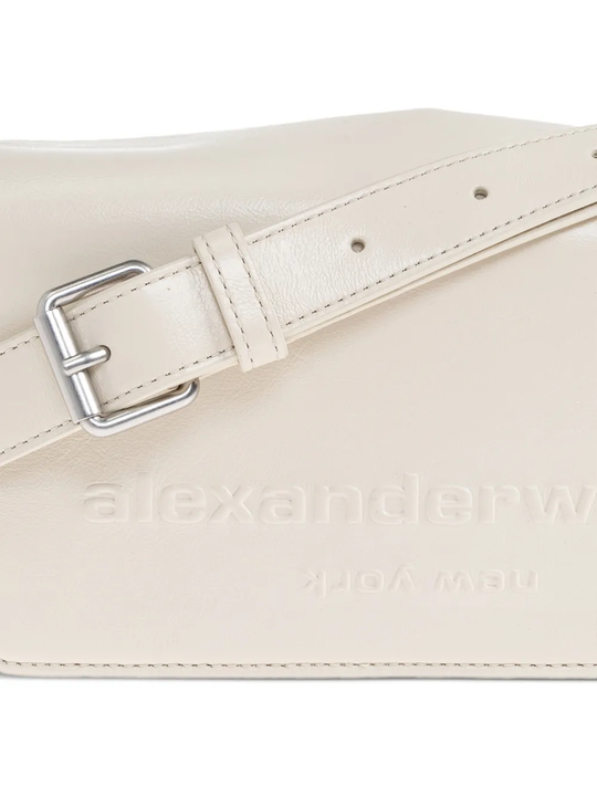 Close up of white handbag,showing texture of the leather fabric.