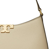 Close up of tan bags, showing texture of the leather and suede fabric