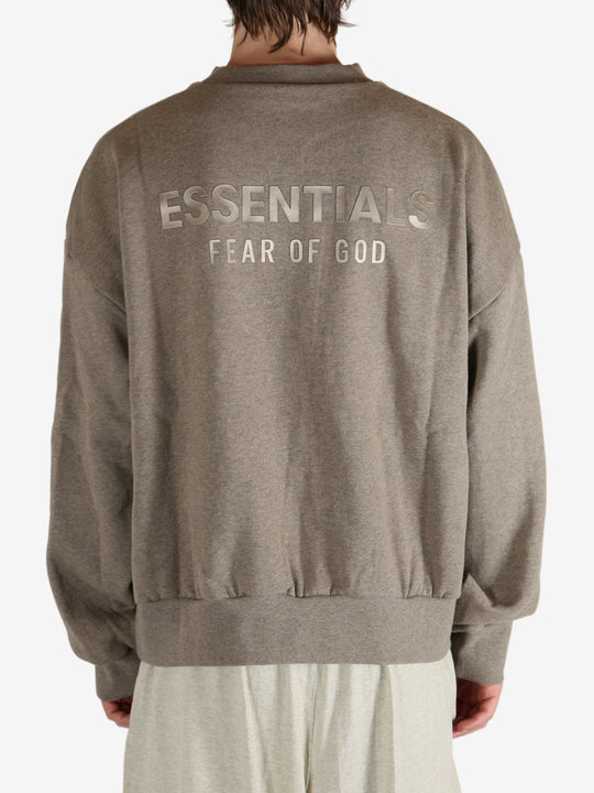 Grey tops worn by a person, showing the  tops fit