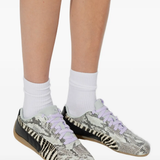 Close up of black flats, showing texture of the polyurethane fabric