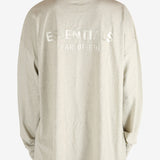 Tan tops worn by a person, showing the tops fit