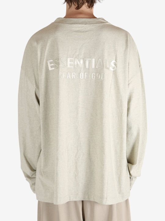 Tan tops worn by a person, showing the tops fit