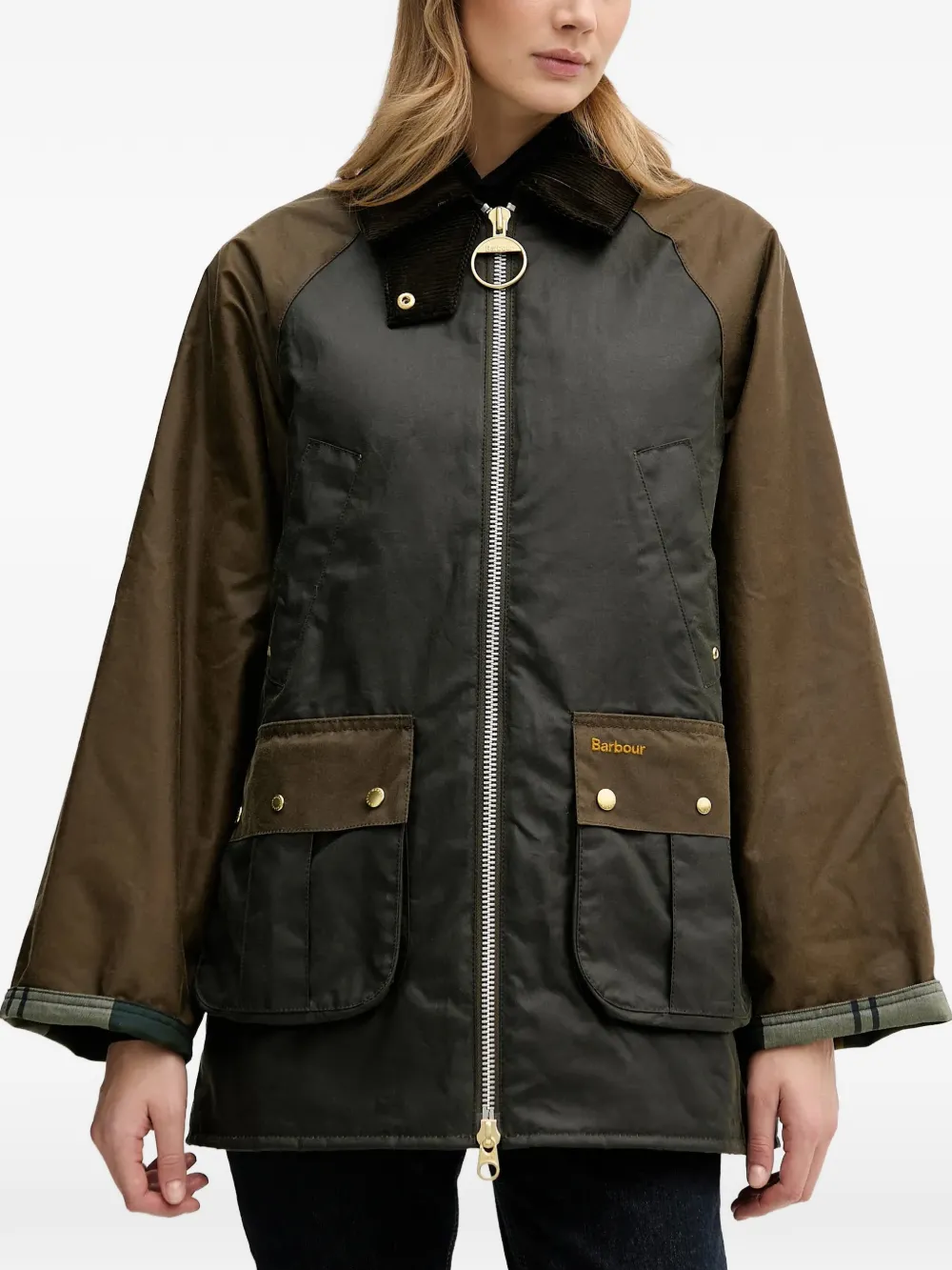 Brown jacket worn by a person, showing the jacket fit