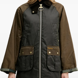 Brown jacket worn by a person, showing the jacket fit