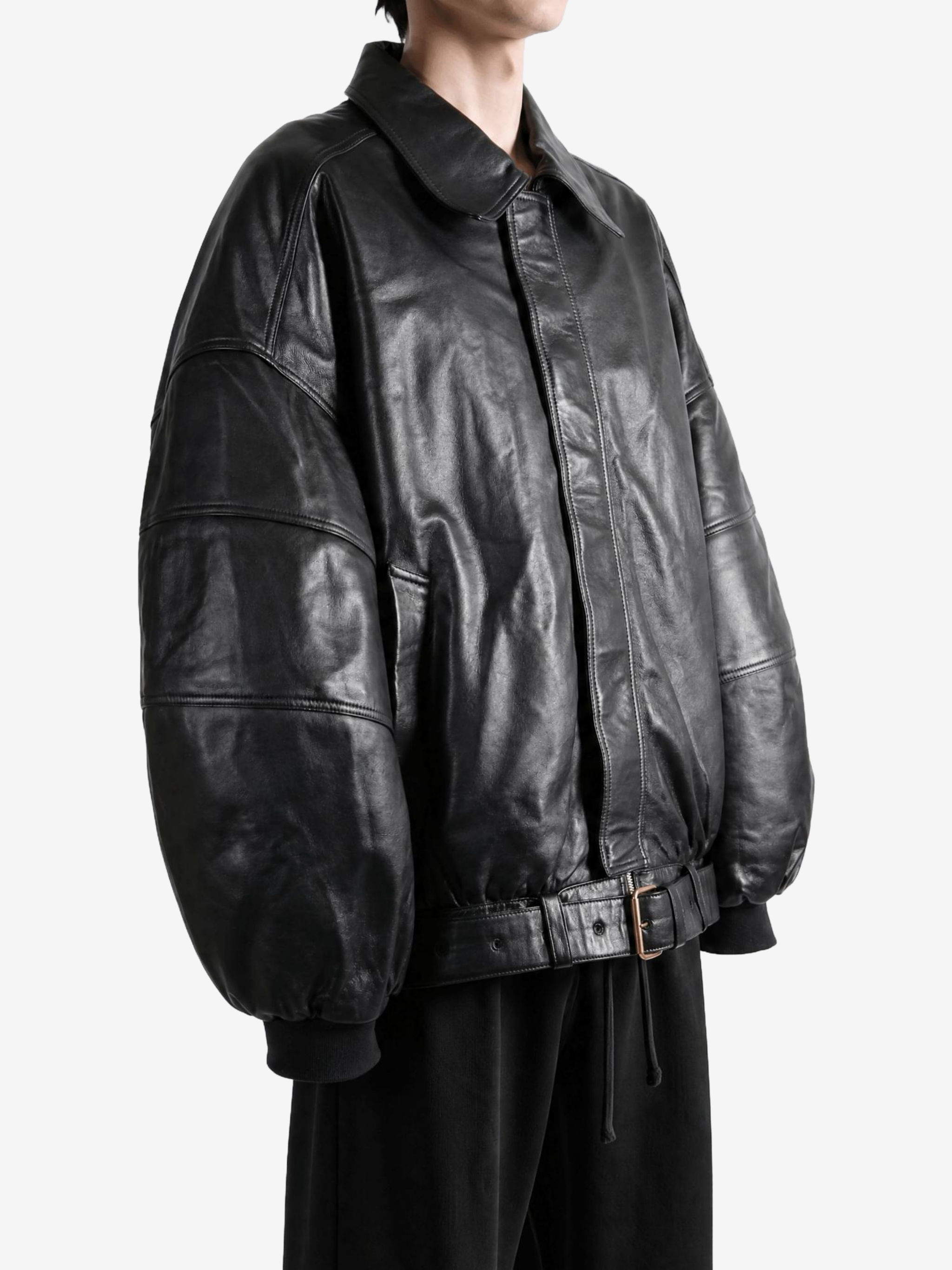 Black hoodie worn by a person, showing the hoodie fit