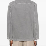 Grey coat worn by a person, showing the coat's fit