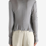 Grey top worn by a person, showing the top's fit