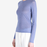 Blue t-shirt worn by a person, showing the t-shirt fit