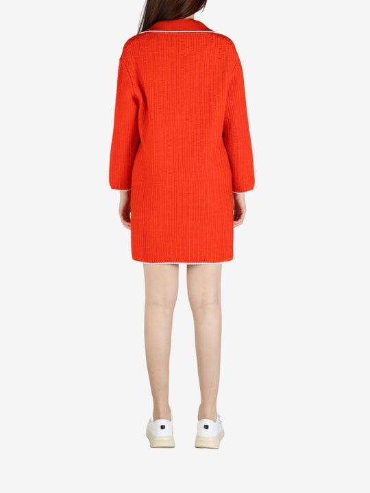 Orange dresses worn by a person, showing the dress's fit