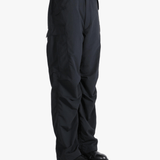 Black pants worn by a person, showing the pants fit