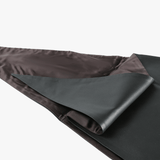 Close up of black scarf, showing texture of the cotton fabric