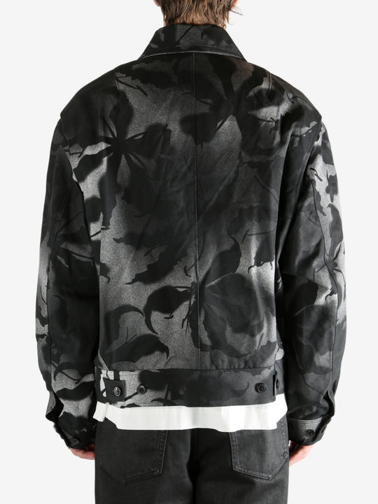 Black jacket worn by a person, showing the jacket's fit