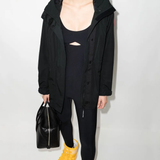 Close up of black jackets, showing texture of the polyester fabric