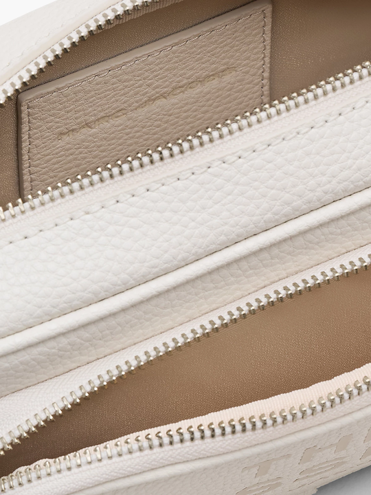 Close up of pink bag, showing texture of the leather fabric