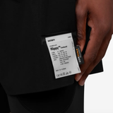Black shorts worn by a person, showing the shorts fit