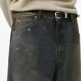 Close up of blue shorts, showing texture of the cotton  fabric