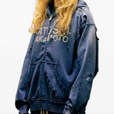 Navy hoodie worn by a person, showing the hoodie fit