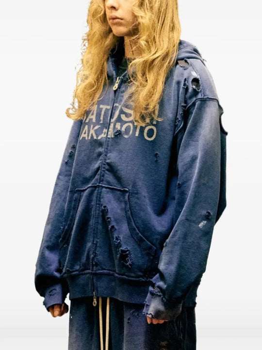 Navy hoodie worn by a person, showing the hoodie fit