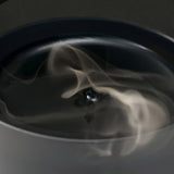 Close up of perfume, showing texture of the wax ingredients