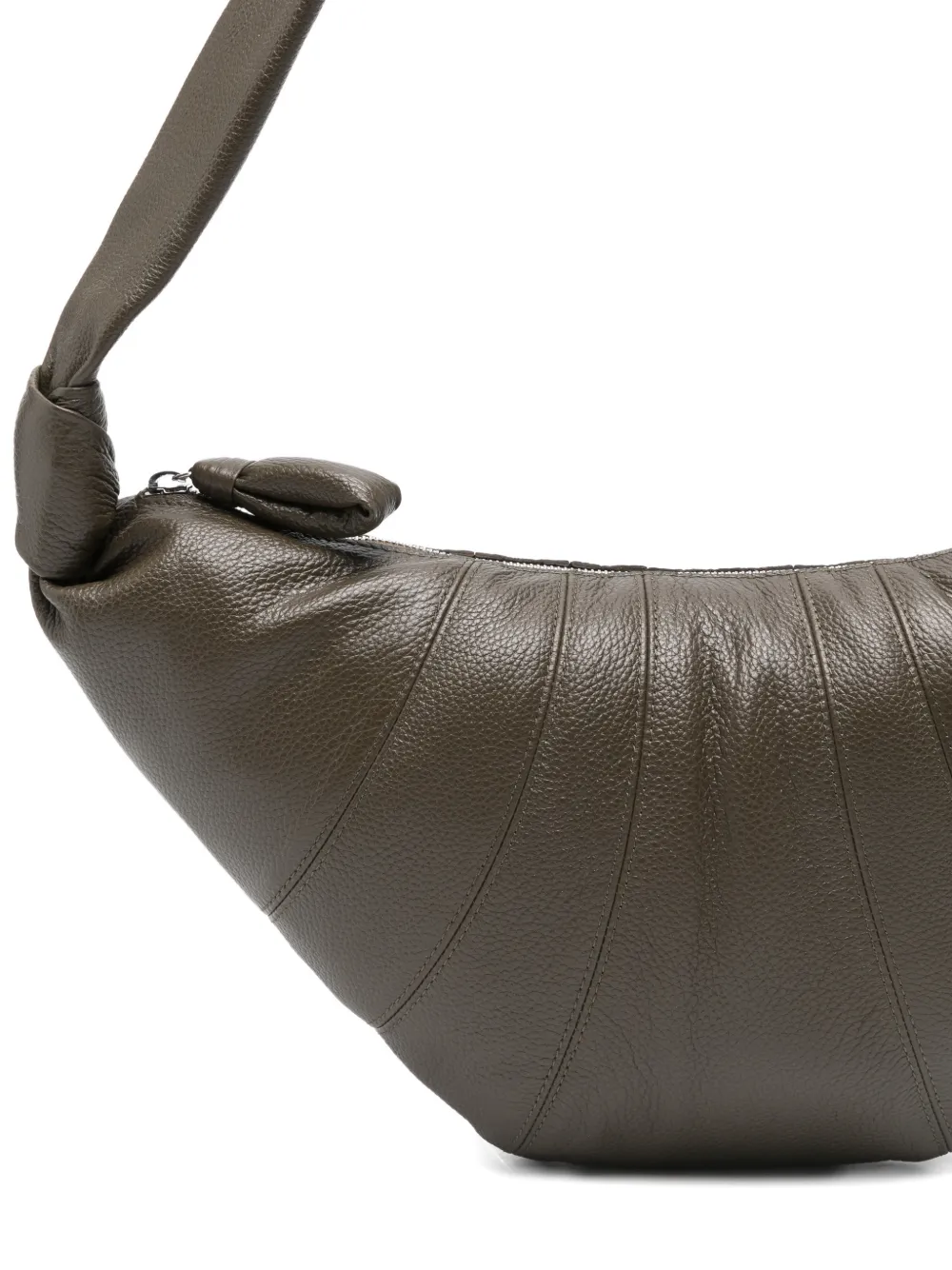 Close up of green bag, showing texture of the Calf Leather fabric