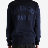 Navy cardigan worn by a person, showing the cardigan's fit