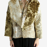 Tan jacket worn by a person, showing the jacket fit