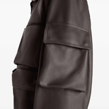 Close up of the brown coats, showing texture of the blended fabric