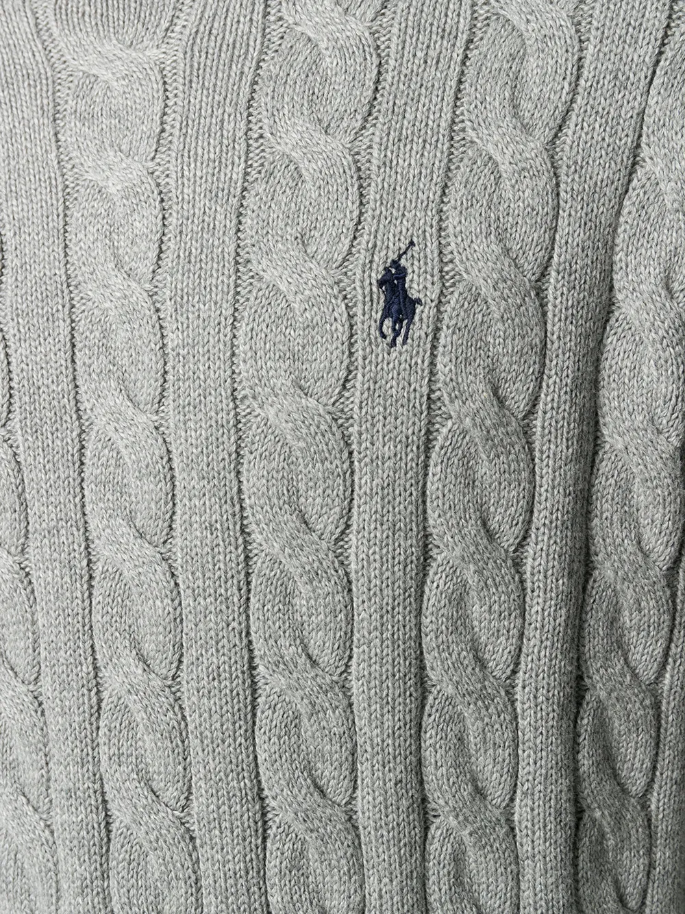 Close up of grey sweater,showing texture of the cotton fabric.