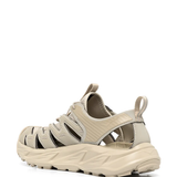 Tan sandals, side view