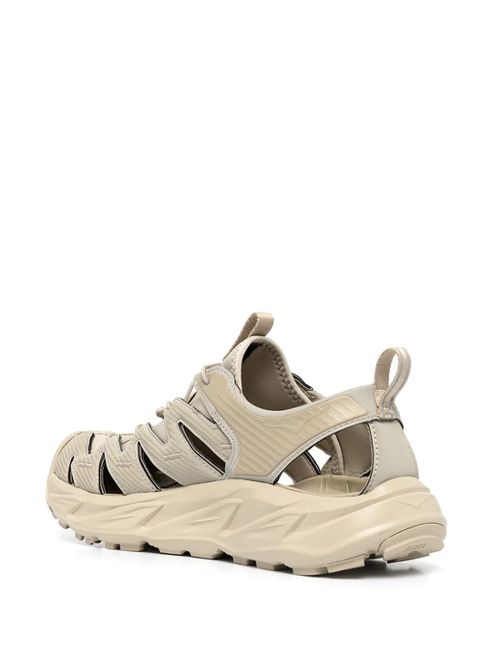 Tan sandals, side view