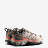 Tan sneakers, side view