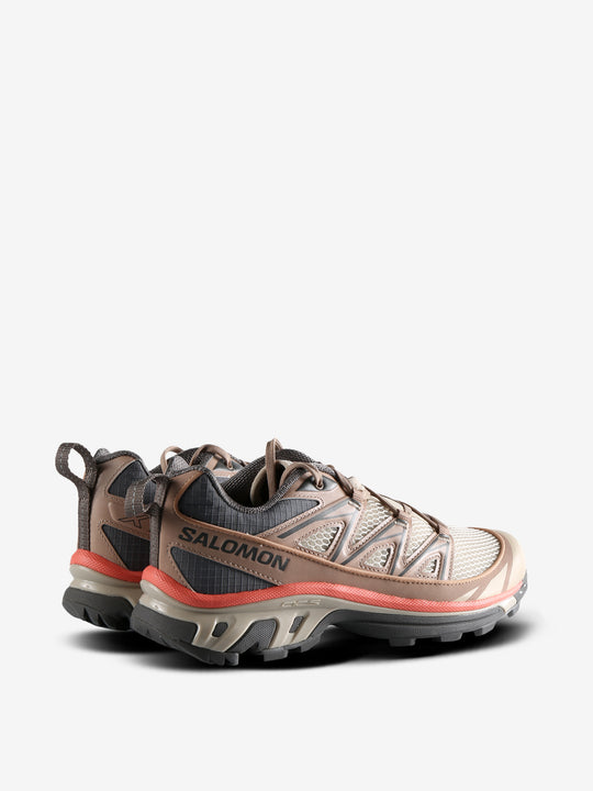 Tan sneakers, side view