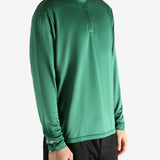 Green pullover worn by a person, showing the pullover's fit