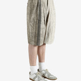 Grey shorts,worn by a person, showing the short's fit