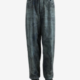 Blue jeans worn by a person, showing the jeans fit