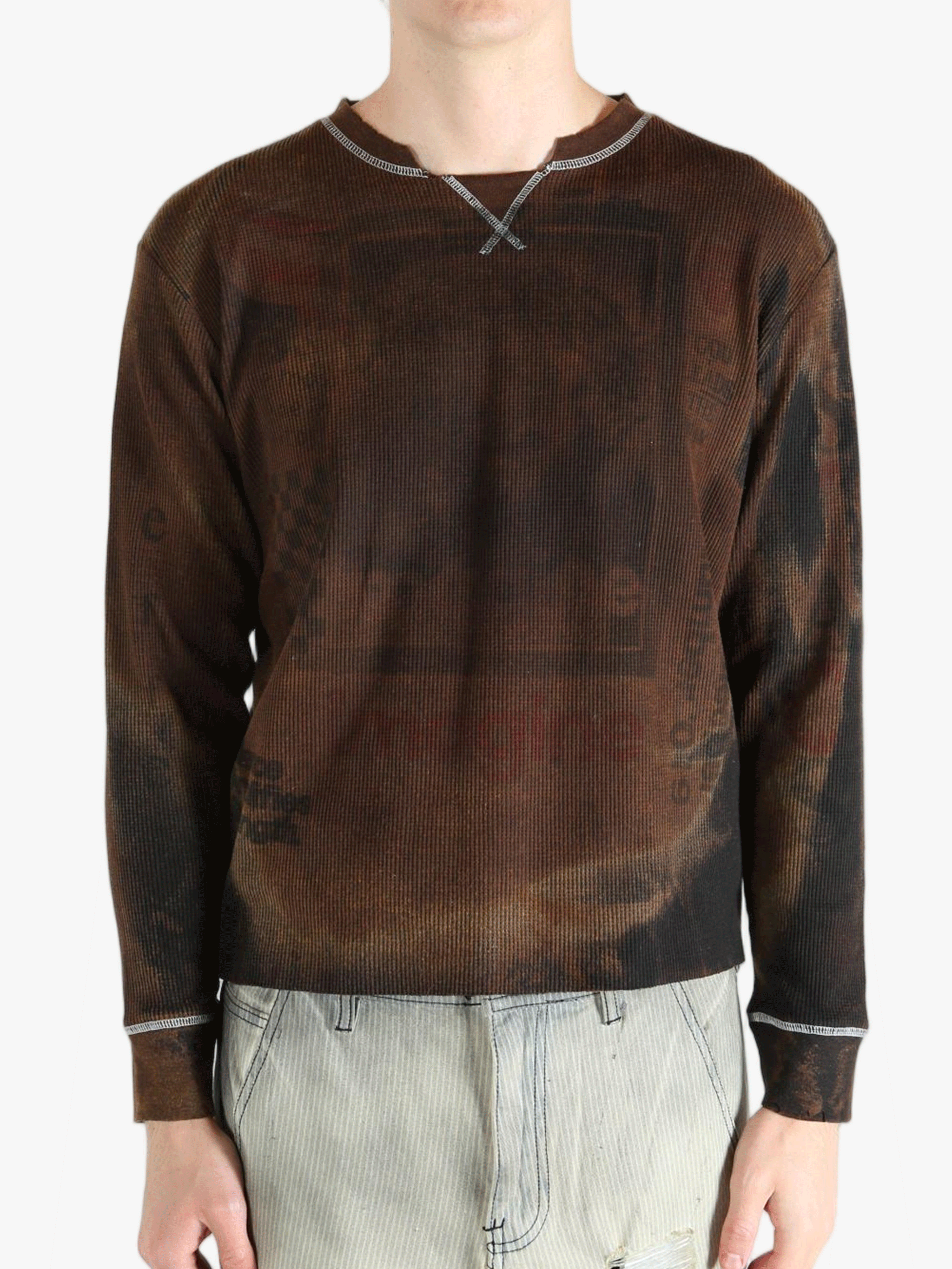 Brown shirts worn by a person, showing the shirts fit