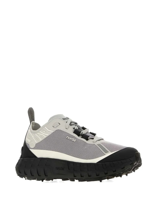 Grey sneakers, side view