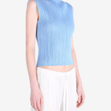 Blue shirt worn by a person, showing the shirt fit