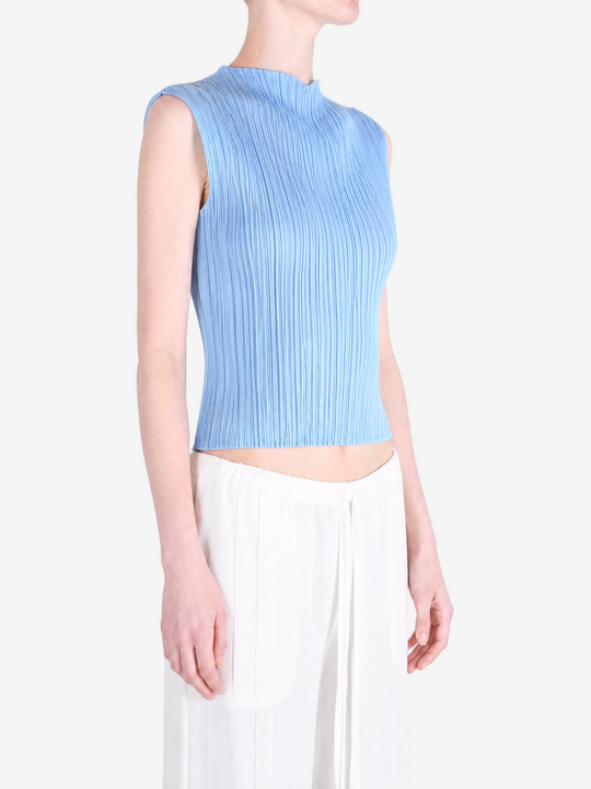 Blue shirt worn by a person, showing the shirt fit