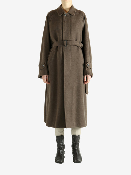 Brown coat worn by a person, showing the coat fit