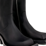 close up of black boots, showing texture of the  nubuck leather  fabric